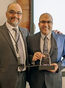Dr. Ian Preyra with award recipient Dr. Alim Pardhan
