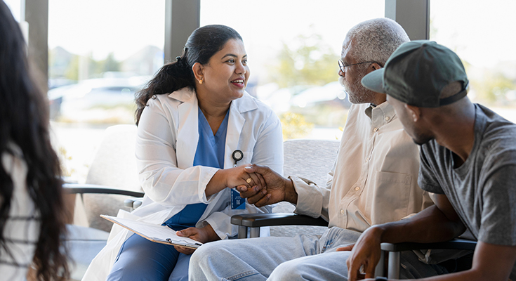 A physician greeting a patient