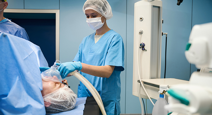 An anaesthesiologist treating a patient